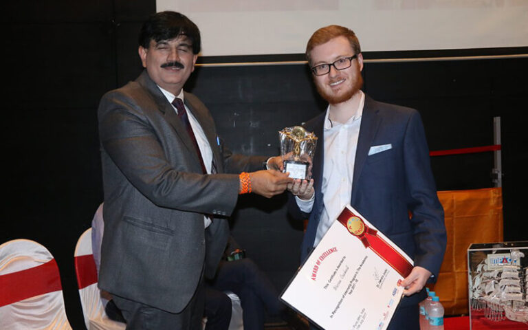 Educational Philanthropy Jitendra Joshi - felicitating International student with Award of Excellence