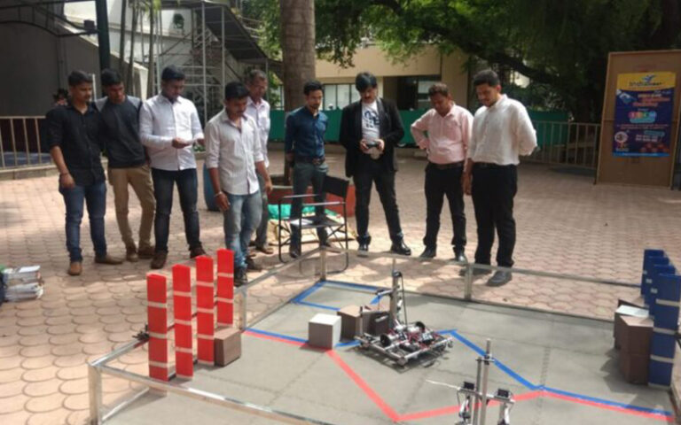 Youth Inspiration Jitendra Joshi inspecting projects at an Exhibition