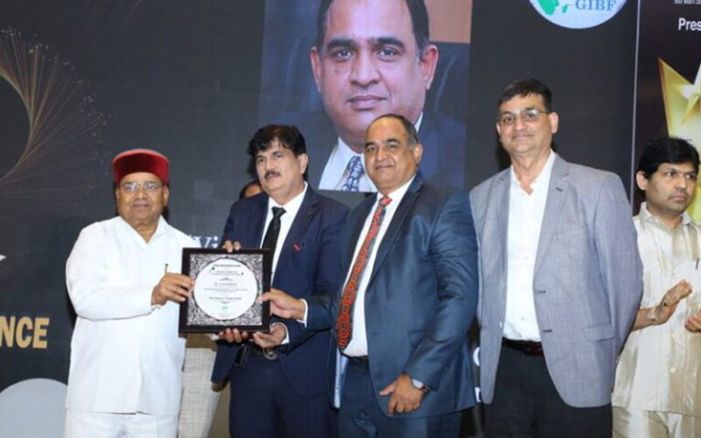 Y.S.R. Murthy being felicitated by Hon. Thawar Chand Gehlot at a National Programme organised by Jitendra Joshi